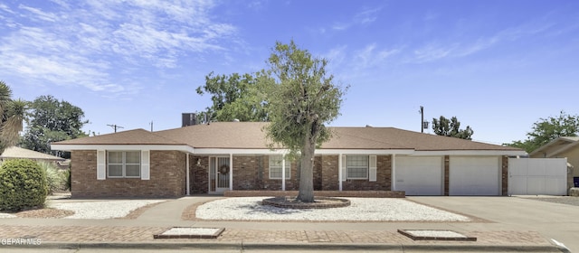 single story home with a garage