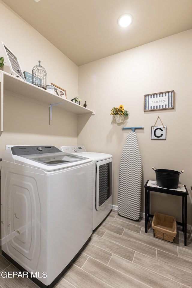 laundry area with washer and dryer