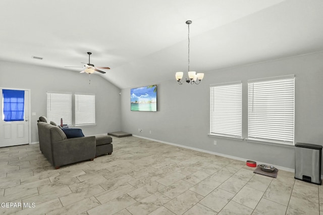 living room with ceiling fan with notable chandelier and lofted ceiling