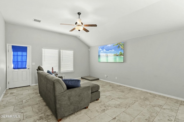 living room featuring vaulted ceiling and ceiling fan