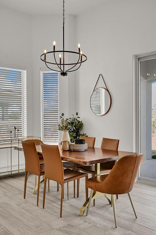 dining room featuring a chandelier and light wood-type flooring