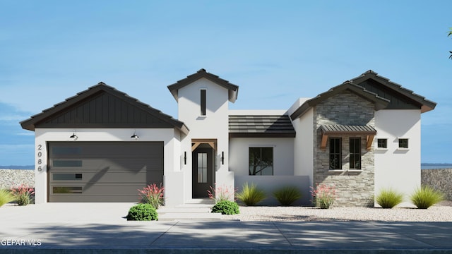 view of front of home with a garage