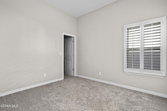 view of carpeted spare room