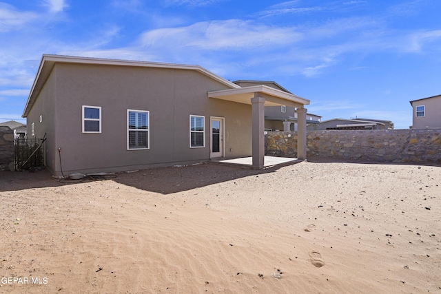 back of house featuring a patio