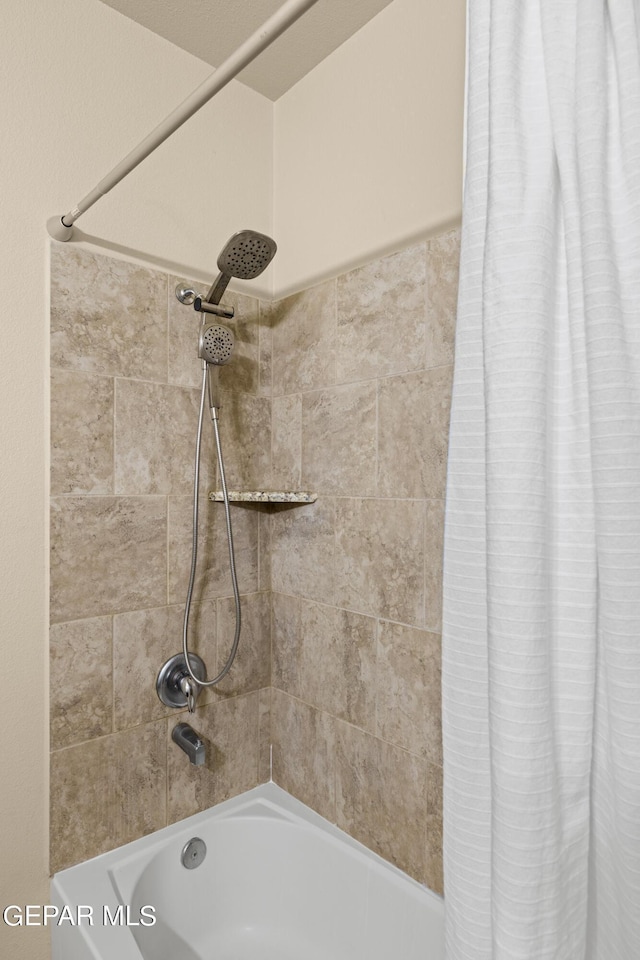 room details with shower / tub combo