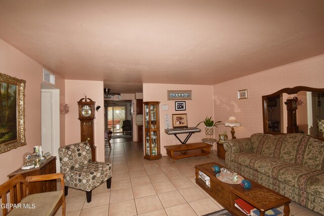 living room with tile flooring