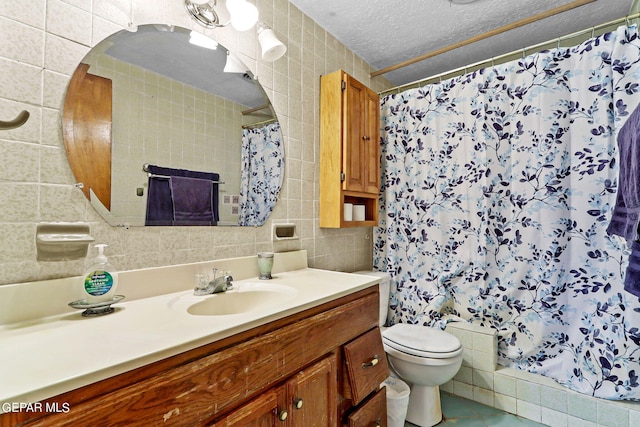 bathroom with a textured ceiling, toilet, decorative backsplash, vanity, and tile walls