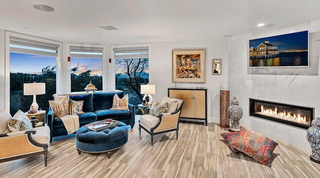 928 Singing Hills Dr, El Paso, TX 79912 - living area featuring recessed lighting, wood finished floors, a tile fireplace, and visible vents