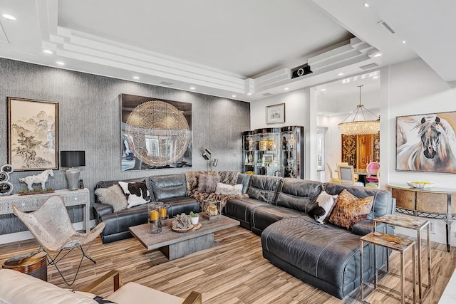 928 Singing Hills Dr, El Paso, TX 79912 - living room featuring a tray ceiling, wood finished floors, a notable chandelier, and recessed lighting