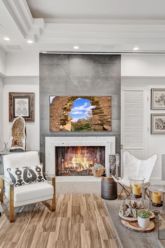 928 Singing Hills Dr, El Paso, TX 79912 - living area featuring wood finished floors, a tile fireplace, and recessed lighting