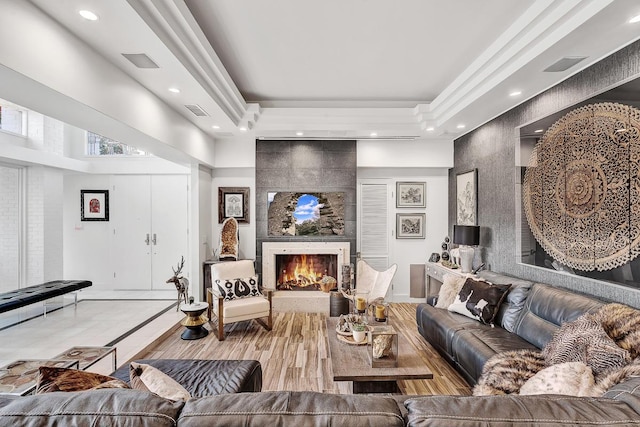 928 Singing Hills Dr, El Paso, TX 79912 - living area featuring a tiled fireplace, baseboards, visible vents, and recessed lighting