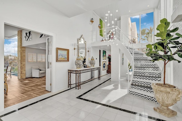 928 Singing Hills Dr, El Paso, TX 79912 - entrance foyer featuring a high ceiling and stairs