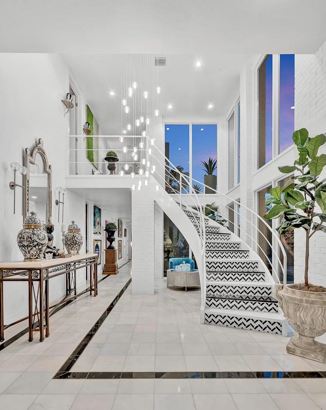 928 Singing Hills Dr, El Paso, TX 79912 - entrance foyer featuring visible vents, a towering ceiling, recessed lighting, and stairs