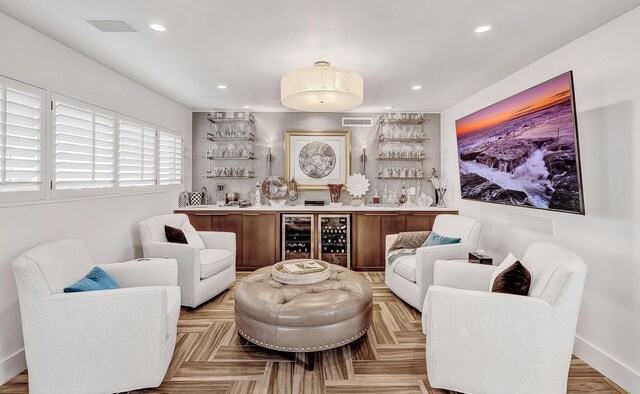928 Singing Hills Dr, El Paso, TX 79912 - living area featuring bar area, visible vents, wine cooler, and recessed lighting