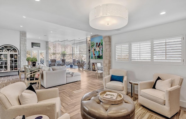 928 Singing Hills Dr, El Paso, TX 79912 - living room featuring recessed lighting, baseboards, and decorative columns