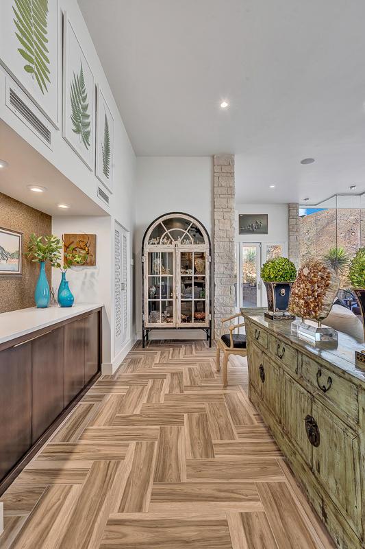 928 Singing Hills Dr, El Paso, TX 79912 - hallway with baseboards and visible vents