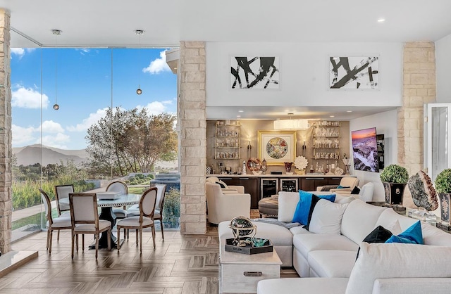 928 Singing Hills Dr, El Paso, TX 79912 - living area featuring recessed lighting, a wealth of natural light, a mountain view, and a wall of windows