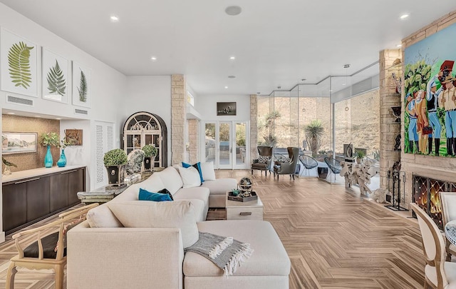 928 Singing Hills Dr, El Paso, TX 79912 - living room featuring a towering ceiling, visible vents, and recessed lighting