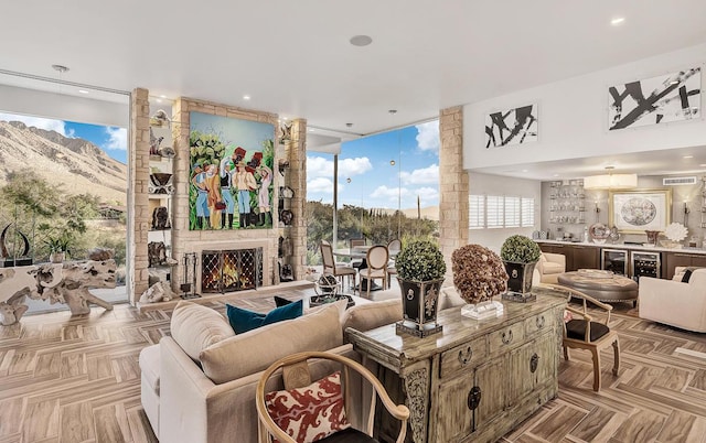 928 Singing Hills Dr, El Paso, TX 79912 - living room featuring a wealth of natural light, expansive windows, a large fireplace, and recessed lighting