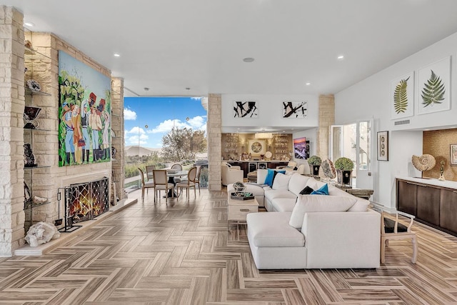 928 Singing Hills Dr, El Paso, TX 79912 - living room featuring a stone fireplace and recessed lighting