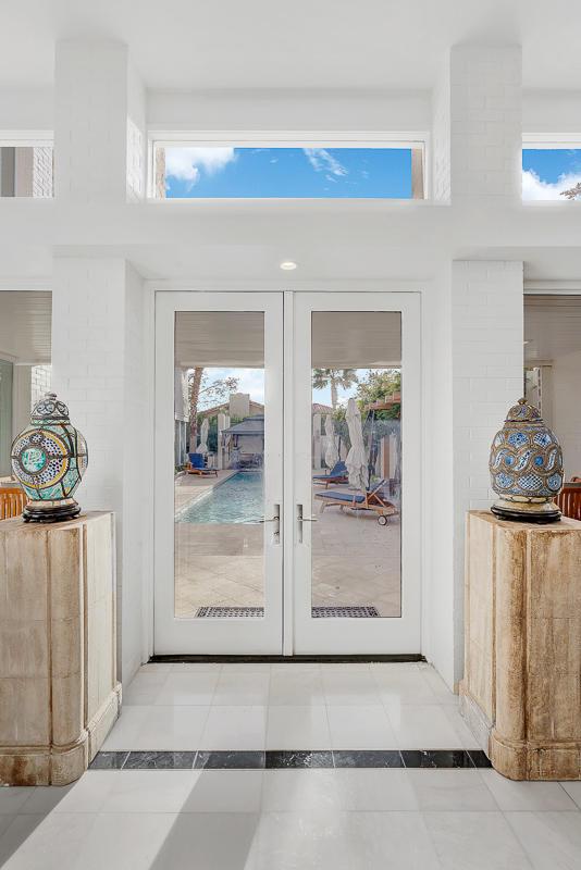 928 Singing Hills Dr, El Paso, TX 79912 - doorway with a wealth of natural light, french doors, and light tile patterned floors