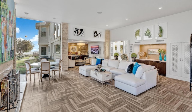 928 Singing Hills Dr, El Paso, TX 79912 - living area with a towering ceiling and visible vents