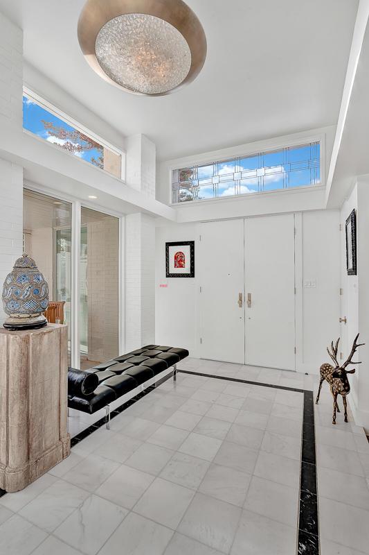 928 Singing Hills Dr, El Paso, TX 79912 - foyer featuring a healthy amount of sunlight and a towering ceiling