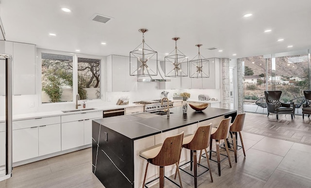 928 Singing Hills Dr, El Paso, TX 79912 - kitchen featuring modern cabinets, white cabinets, a sink, and visible vents