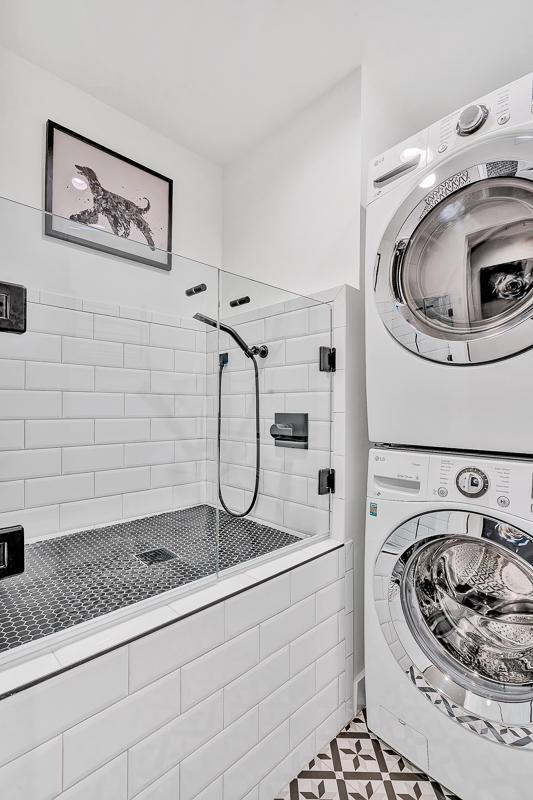 928 Singing Hills Dr, El Paso, TX 79912 - washroom featuring stacked washer and clothes dryer