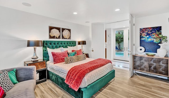 928 Singing Hills Dr, El Paso, TX 79912 - bedroom with wood finished floors, recessed lighting, and access to exterior