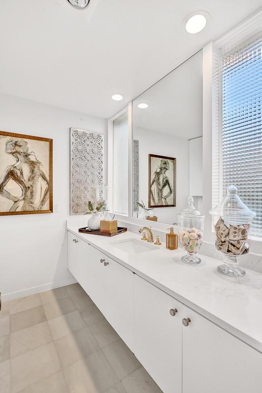 928 Singing Hills Dr, El Paso, TX 79912 - bathroom featuring recessed lighting, a wealth of natural light, vanity, and baseboards