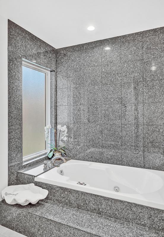 928 Singing Hills Dr, El Paso, TX 79912 - bathroom with a jetted tub