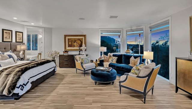 928 Singing Hills Dr, El Paso, TX 79912 - bedroom with light wood finished floors, visible vents, and recessed lighting