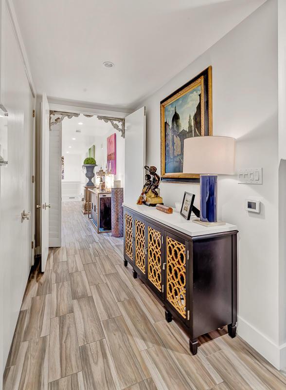 928 Singing Hills Dr, El Paso, TX 79912 - corridor featuring wood finished floors and baseboards