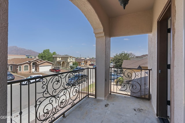 balcony featuring a mountain view