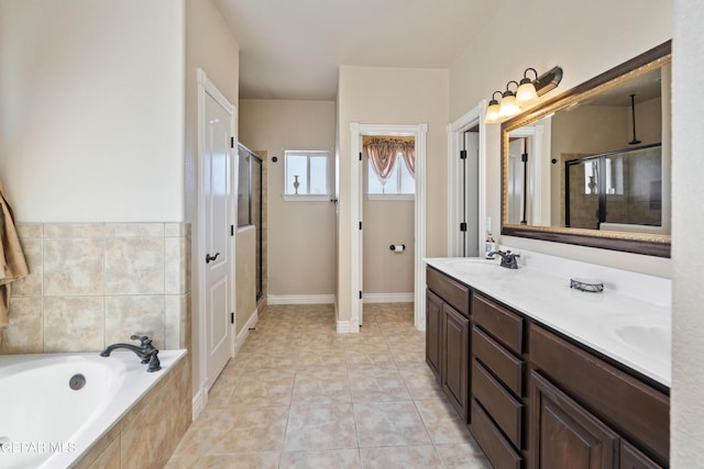 bathroom featuring vanity, separate shower and tub, and tile patterned flooring