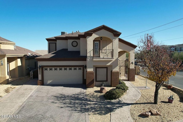 view of front of property with a garage