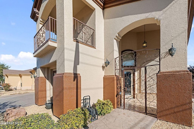 property entrance with a balcony