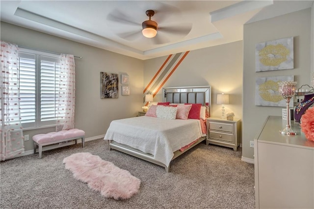 1701 Bull Ring St, El Paso, TX 79928 - bedroom featuring a raised ceiling, ceiling fan, and light carpet