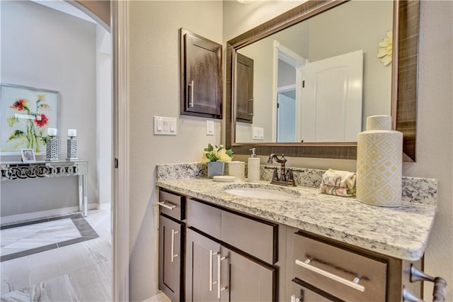 1701 Bull Ring St, El Paso, TX 79928 - bathroom with vanity and tile patterned floors