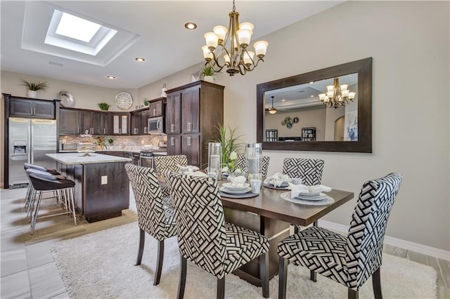 1701 Bull Ring St, El Paso, TX 79928 - dining space with a skylight and a chandelier