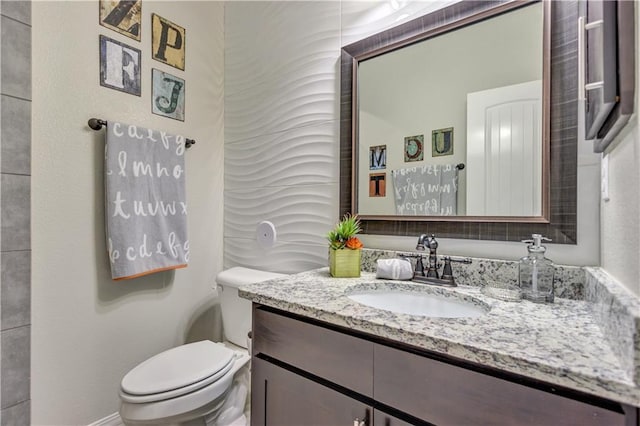 1701 Bull Ring St, El Paso, TX 79928 - bathroom featuring vanity and toilet