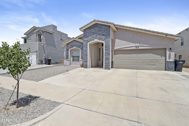 view of front of home with a garage