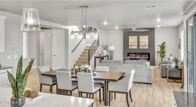 dining room with light wood-type flooring