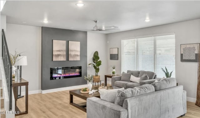 living room with light hardwood / wood-style floors