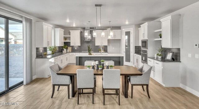 dining area featuring light hardwood / wood-style floors