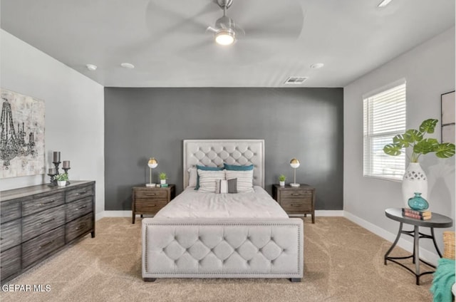 carpeted bedroom featuring ceiling fan