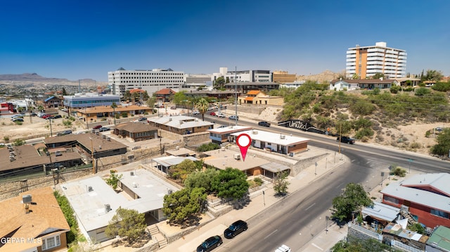 drone / aerial view featuring a city view