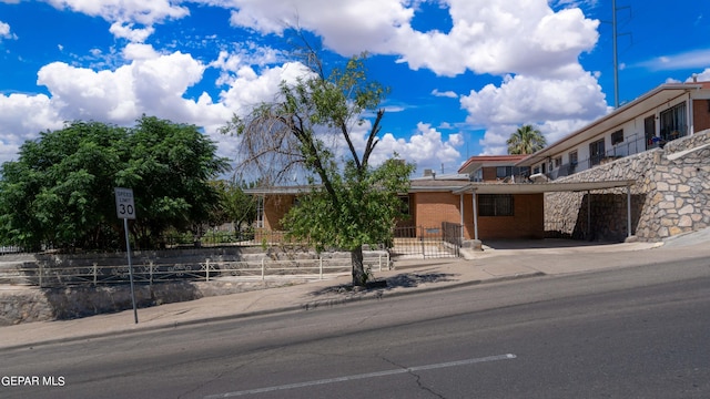 view of front of house with a carport