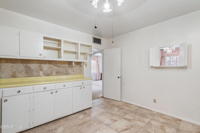 kitchen with white cabinets